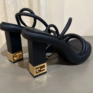 Fendi black pumps.
